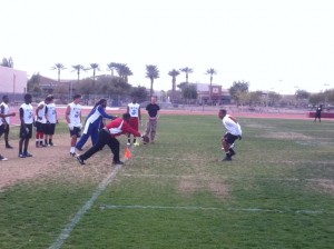 Defensive Backs Coach McMillan doing defensive back drills